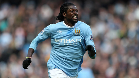 Emmanuel Adebayor celebrates scoring the first goal