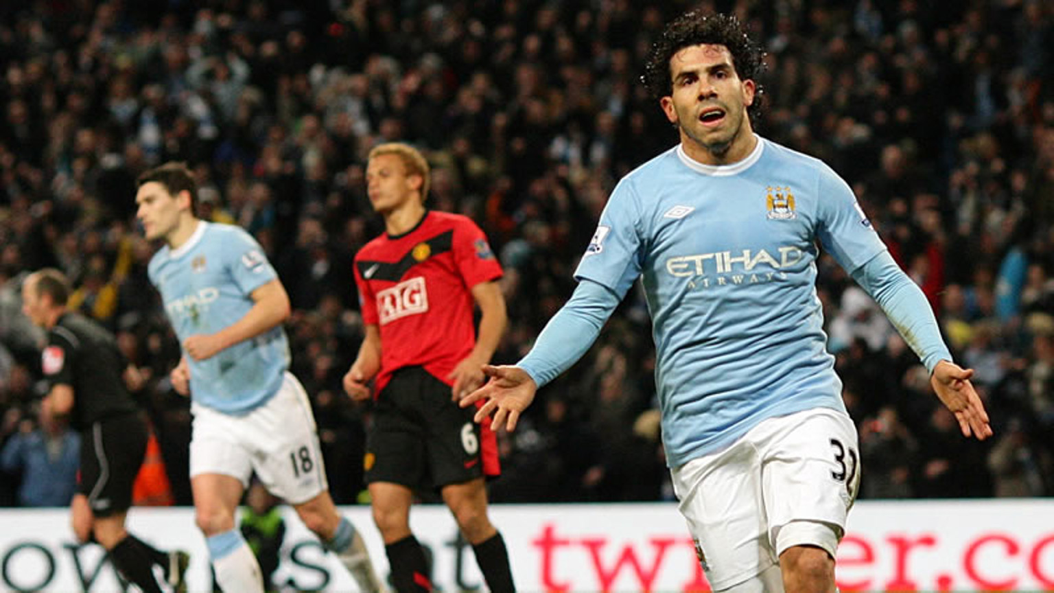 tevez celebrates