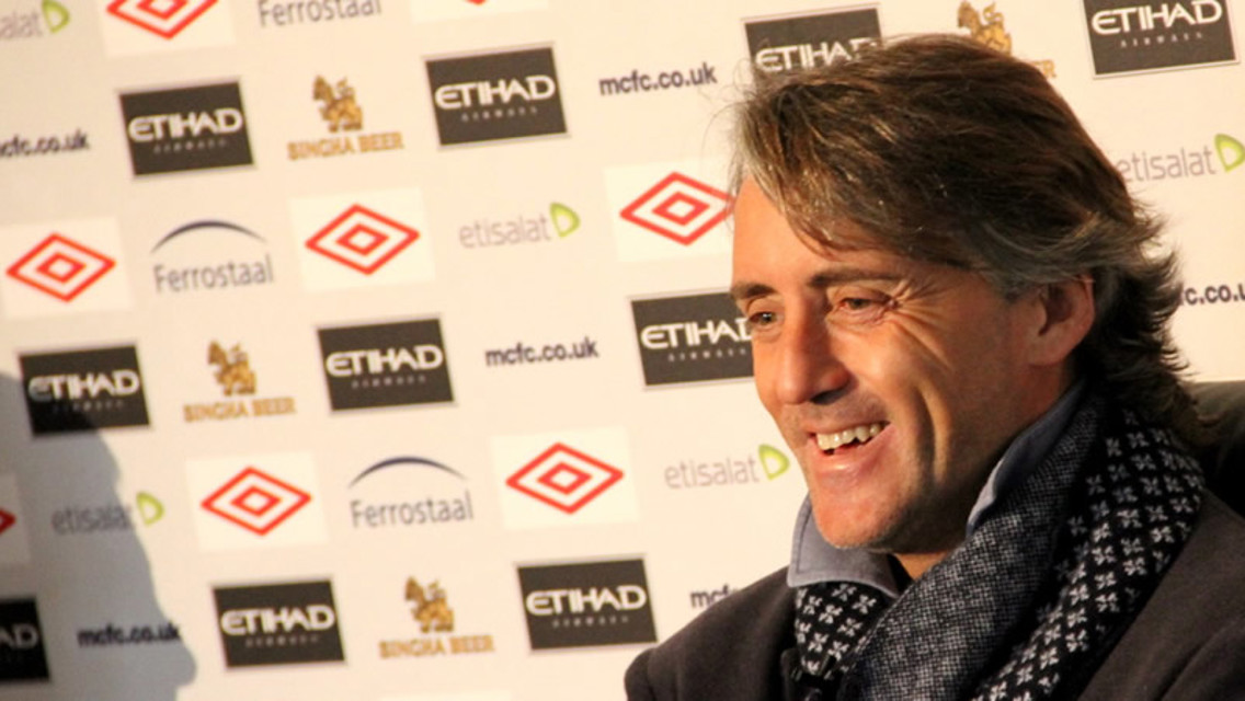 Mancini smiling