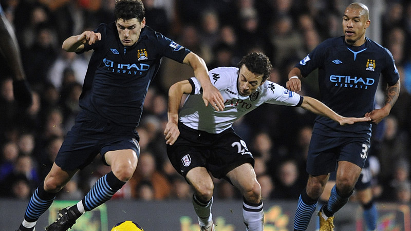 Barry and dejong in action at fulham