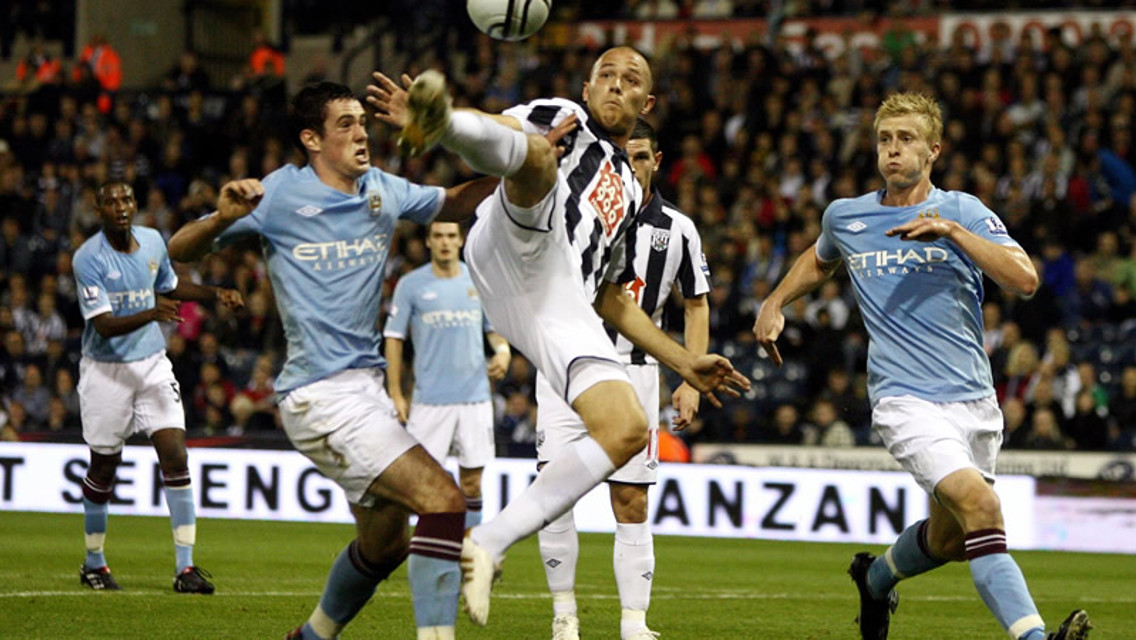 Ben Mee and Greg Go for the ball