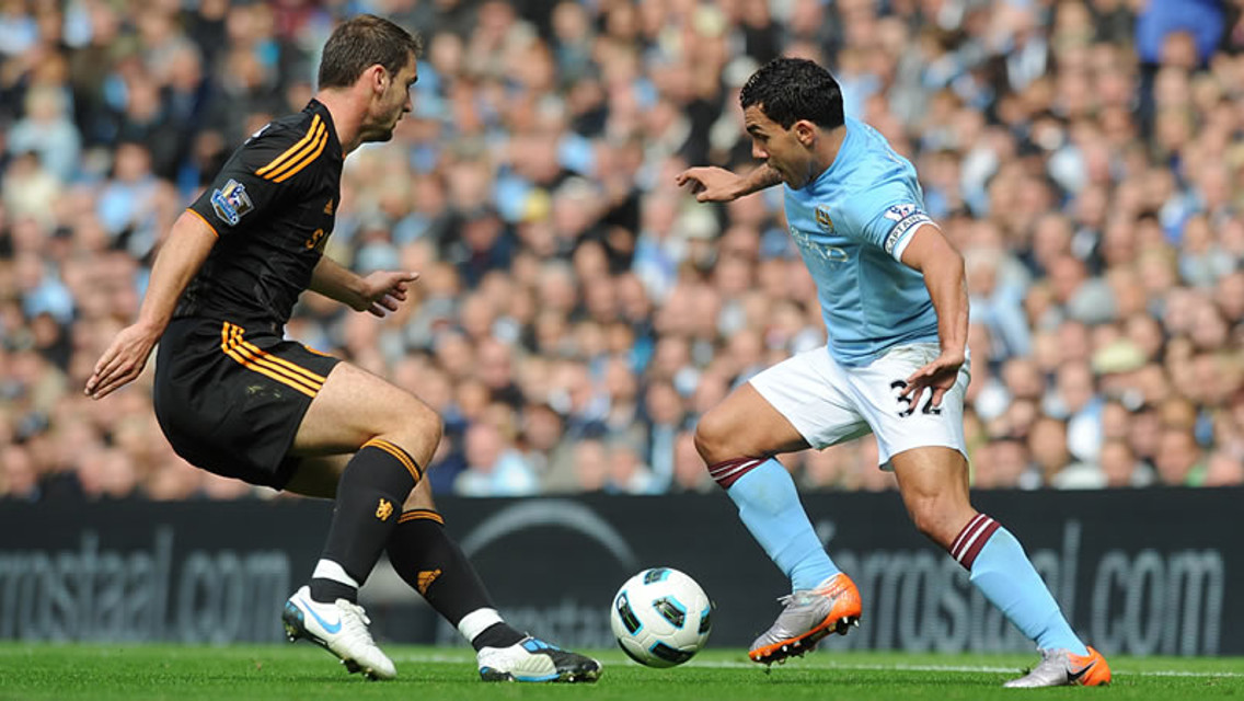 Tevez takes on Ivanovic