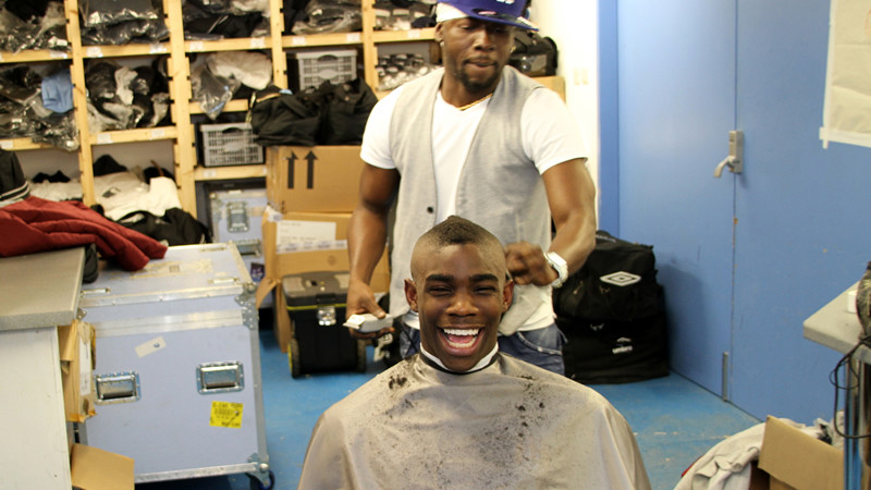 Micah gets his hair cut before training 