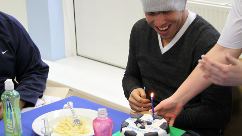 Carlos gets a cake at carra