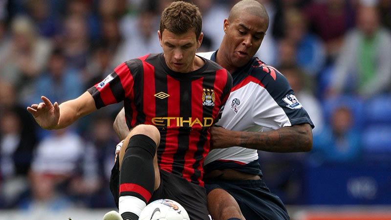 Dezeko and Knight battle for the ball