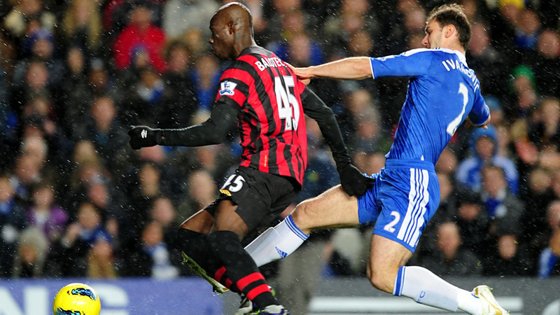 Mario gets past Branislav Ivanovic