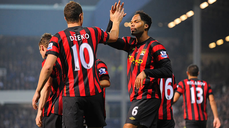 Lescott and Dzeko congratulate each other