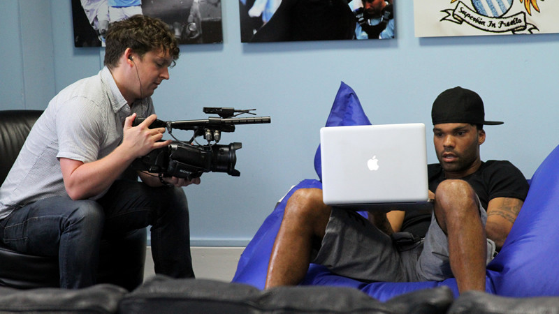 Joleon reading some of the questions sent for him for his city tv interview