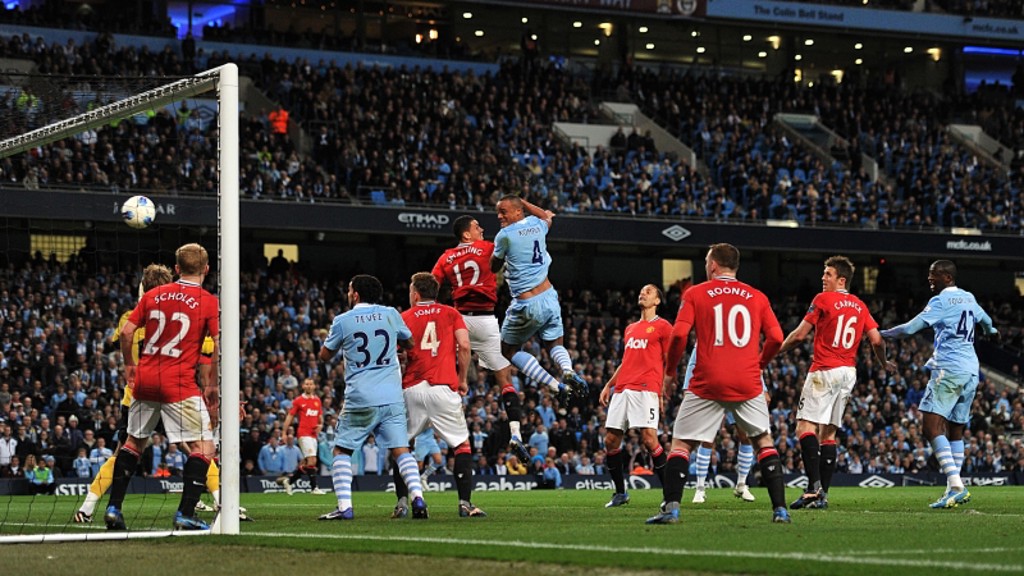 'AVE IT: Kompany heads the winner