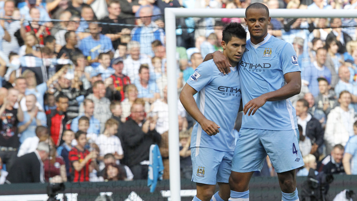 Kompany and Aguero hug