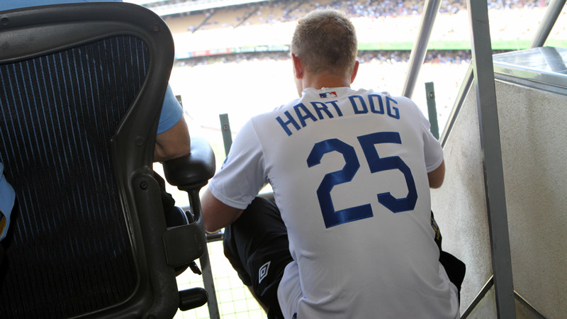 Joe watches the rest of the game in his new pitchers jersey