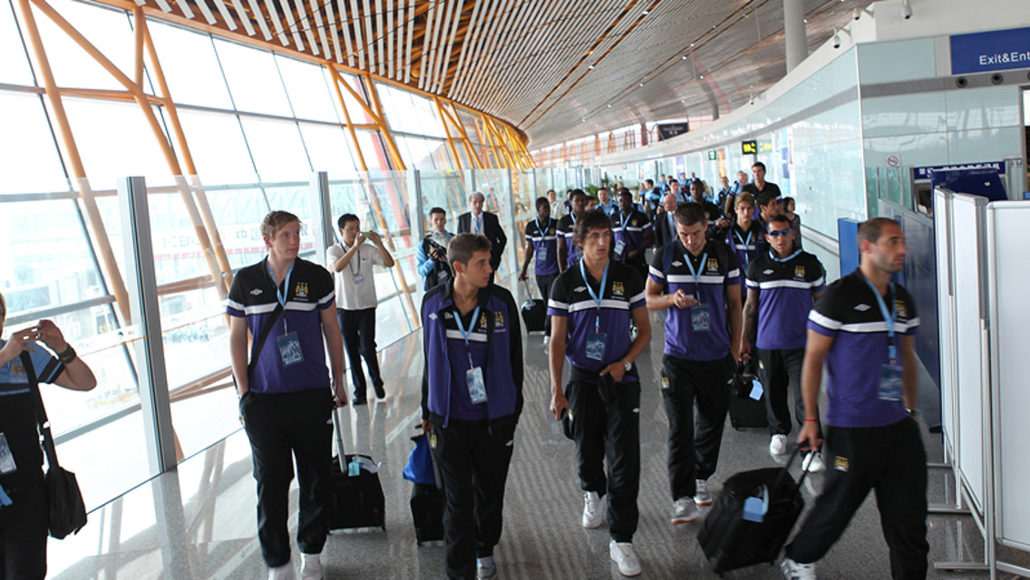 Manchester City squad arrive in Beijing