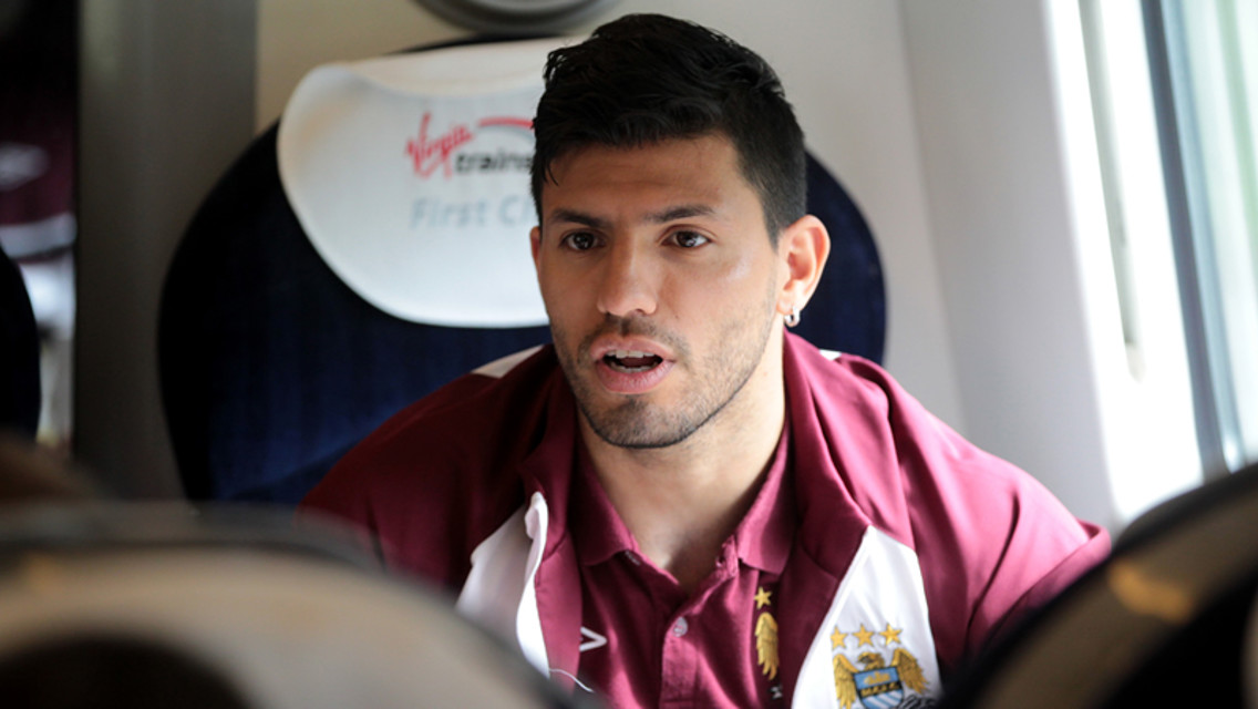Sergio is deep in conversation with Pablo Zabaleta as the train hurtles on to its destination...