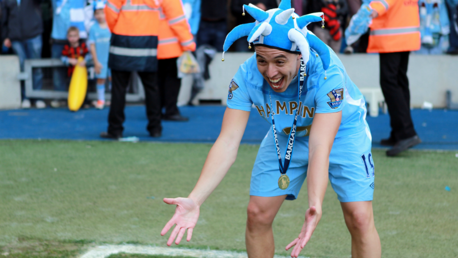 Nasri celebrates his first Premier League title win after that famous 3-2 victory..