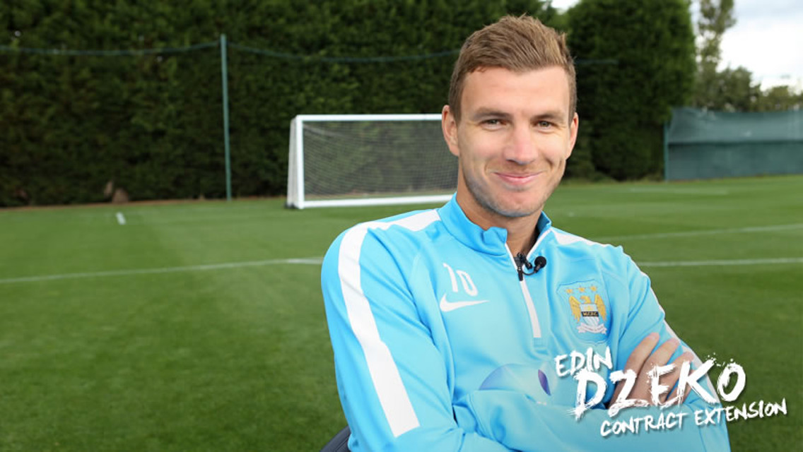 Dzeko signs four-year deal at City