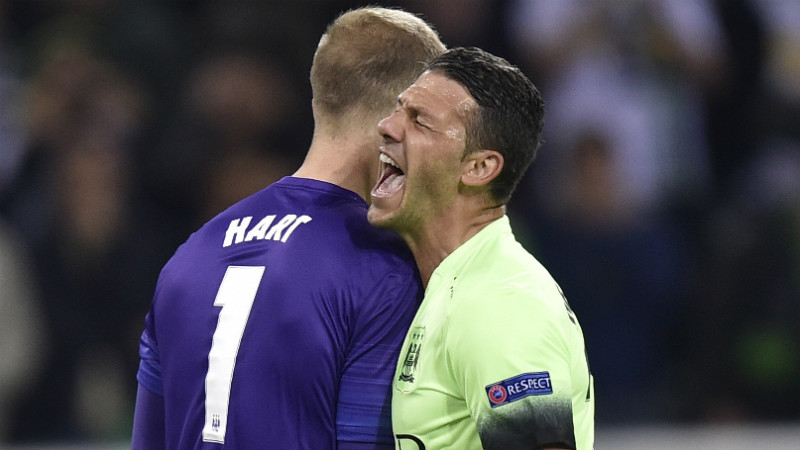 Martin Demichelis and Joe Hart