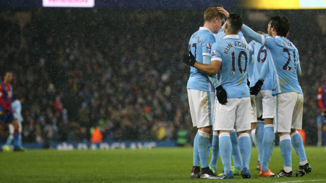 Manchester City players celebrate the fourth goal