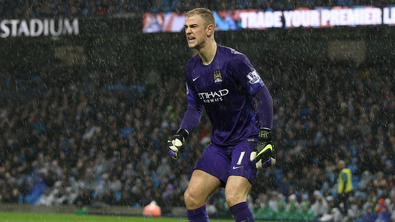 Joe Hart watches on in the rain