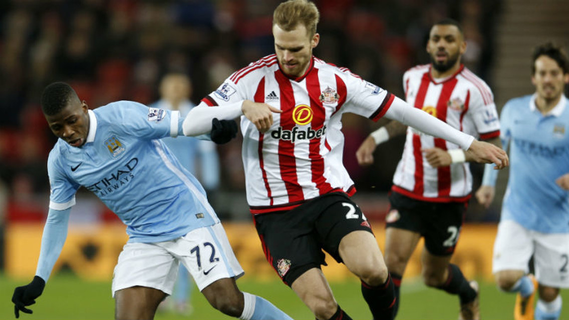 BATTLE: Iheanacho and Kirchoff locked in combat during the last meeting between the sides.