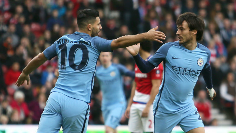 Silva and Aguero celebrate