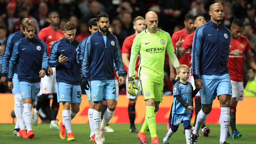 Manchester-City's-Vincent-Kompany-leads-the-team-out