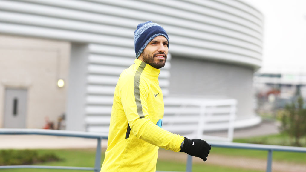 Sergio Aguero walks to training