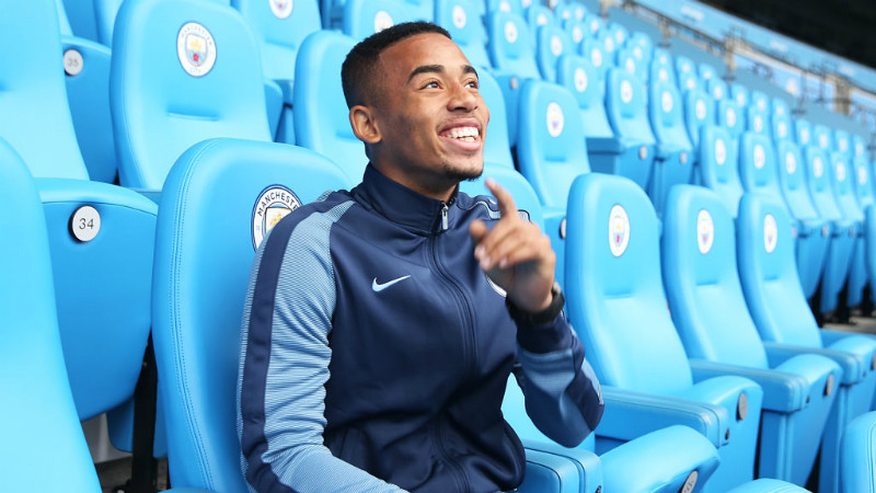 A laughing Gabriel Jesus composes himself for another picture