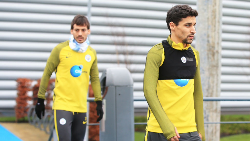 Jesus Navas and David Silva stride out