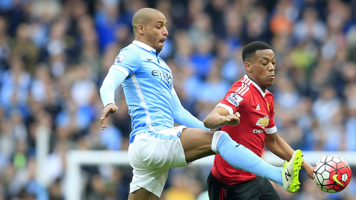 GETTING STUCK IN: Fernando did his bit but the derby was a day to forget for City