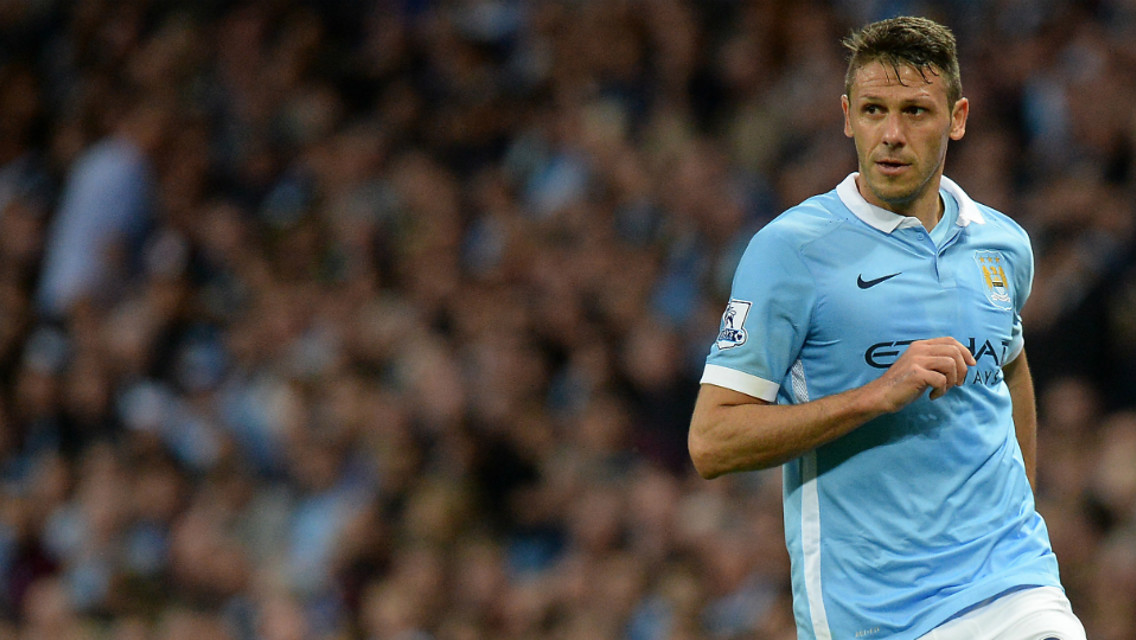 Martin Demichelis and Joe Hart
