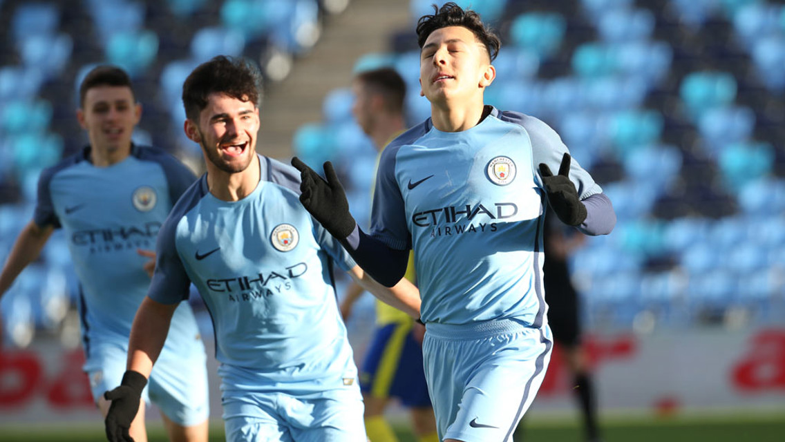 SOLID GROUP: Phil Foden and Ian Carlo Poveda are just two of City's stars so far this season