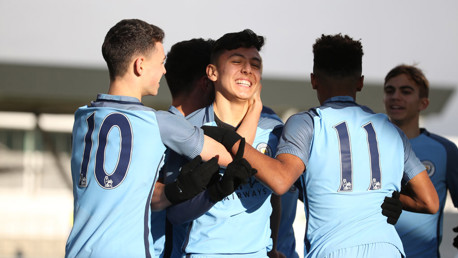 SOLID GROUP: Phil Foden and Ian Carlo Poveda are just two of City's stars so far this season