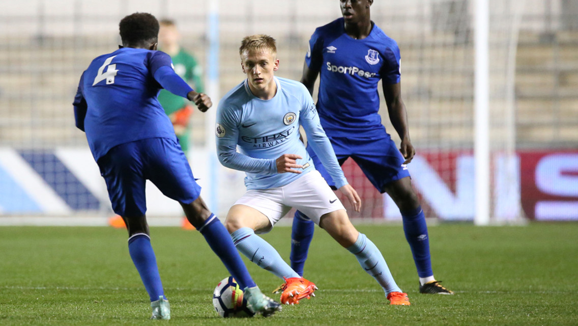 ACTION SHOT: Matt Smith gives chase against Everton.