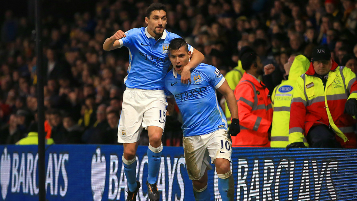 WHAT A FEELING: Jesus Navas celebrates with Sergio Aguero