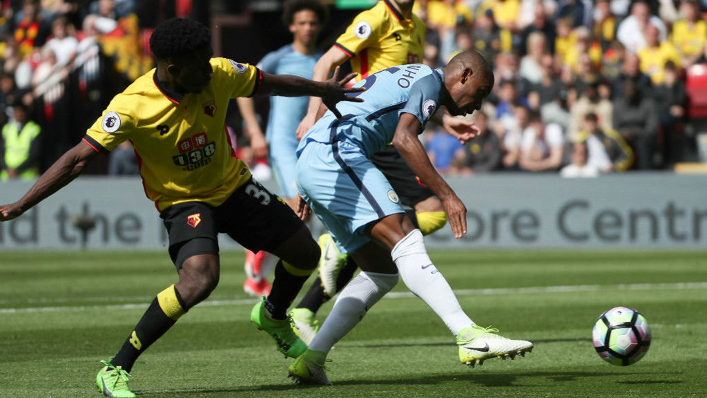 BATTLE: Fernandinho competes for possession
