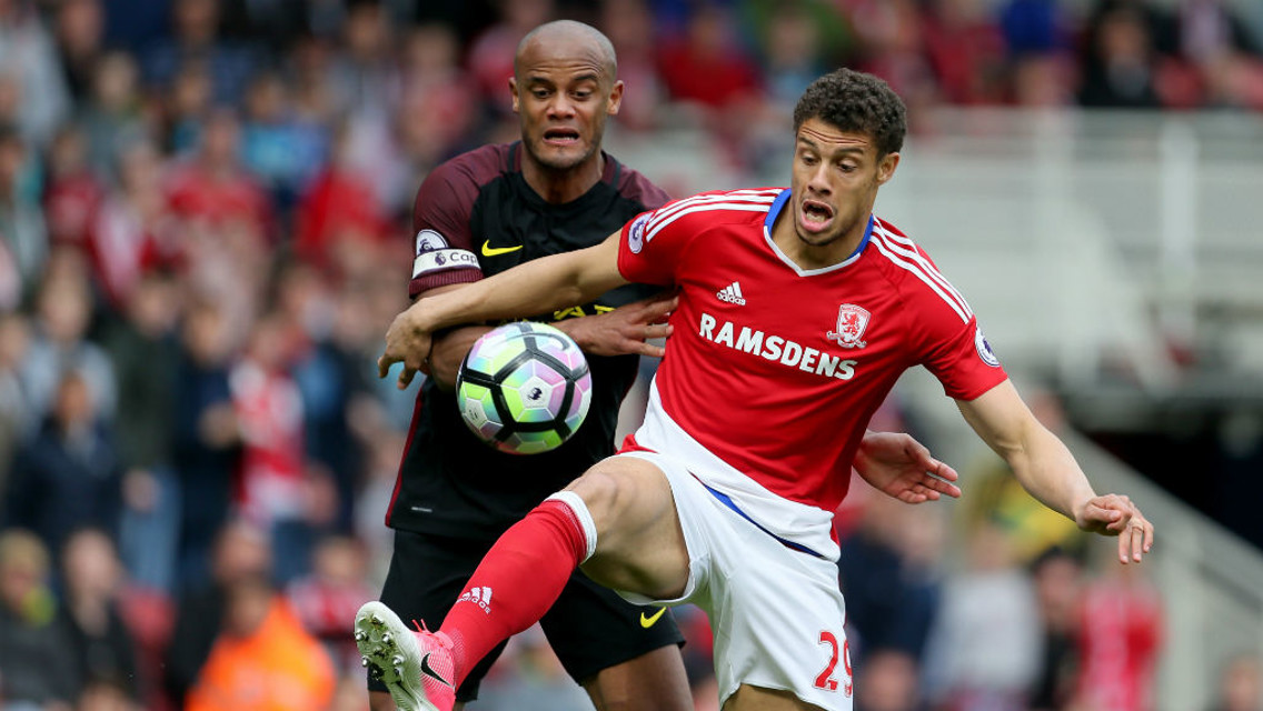 MARKED: Vincent Kompany marshals Rudy Gestede.