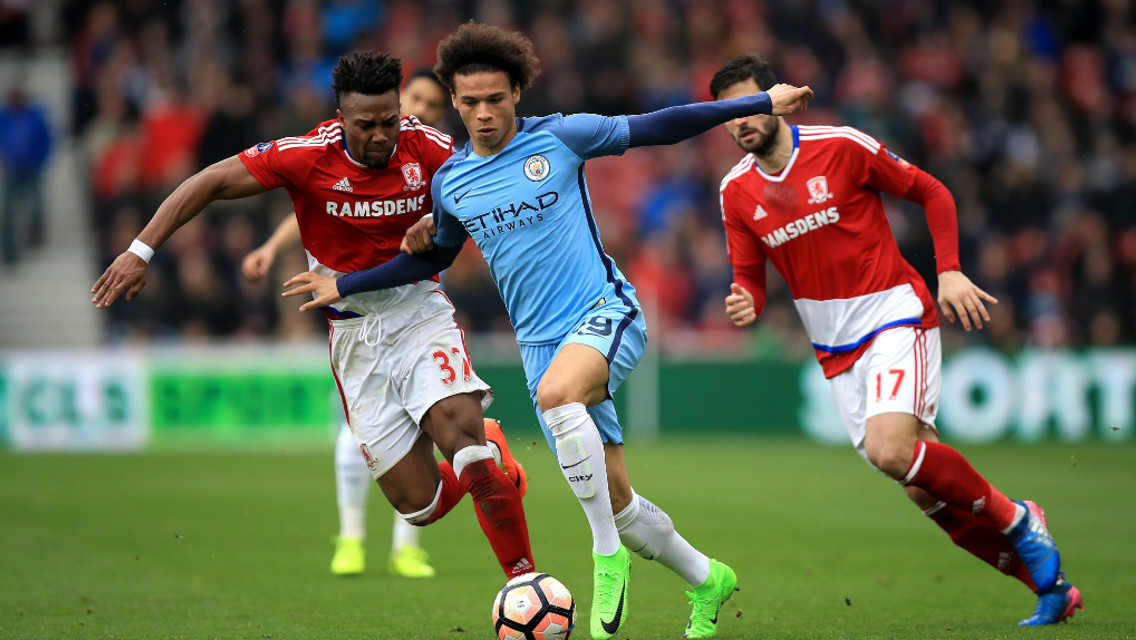 STRENGTH: Sane and Traore battle for the ball.
