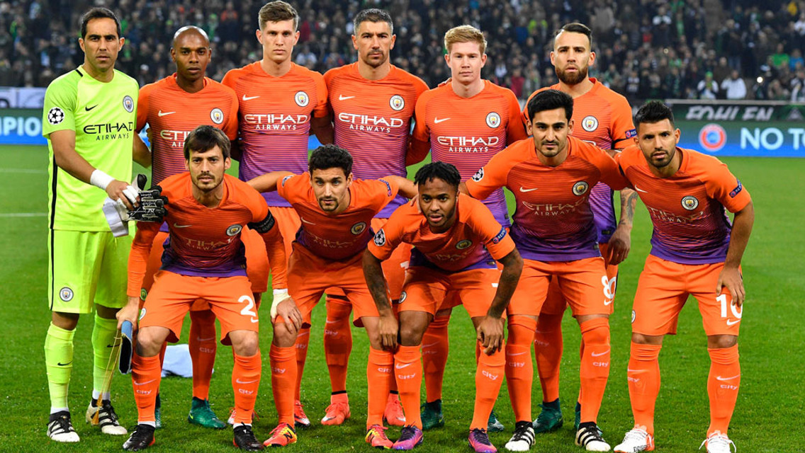 LINE UP: The team pose ahead of kick-off