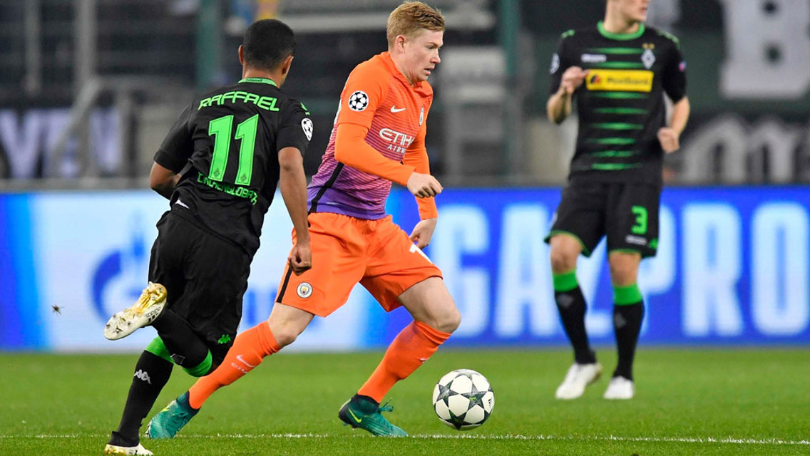 ON THE BALL: Kevin De Bruyne breaks through Gladbach's midfield line