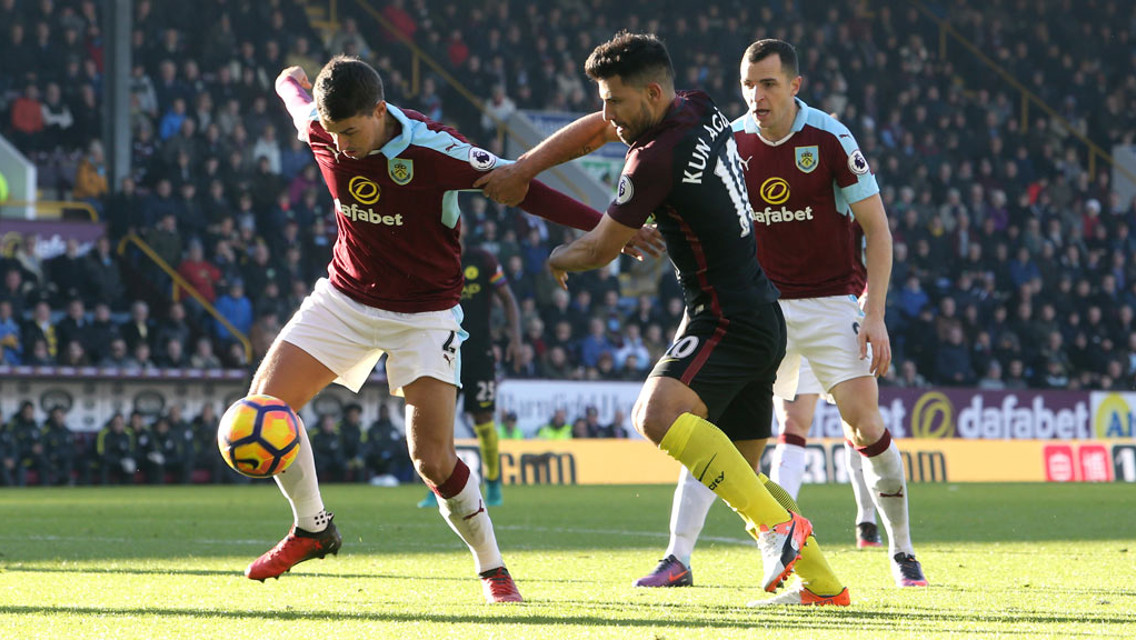 CHALLENGE: Aguero challenges for the ball