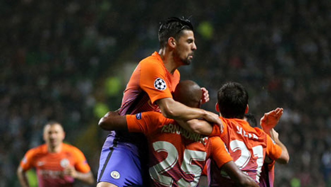TEAM CELEBRATION: Manchester City's Fernandinho celebrates with teammates after scoring his side's first goal 