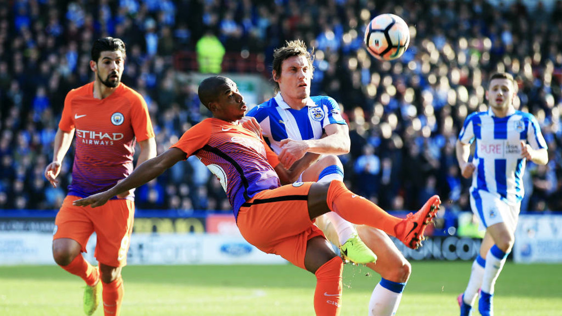 BATTLE: Fernando tussles with the Terriers' Dean Whitehead.