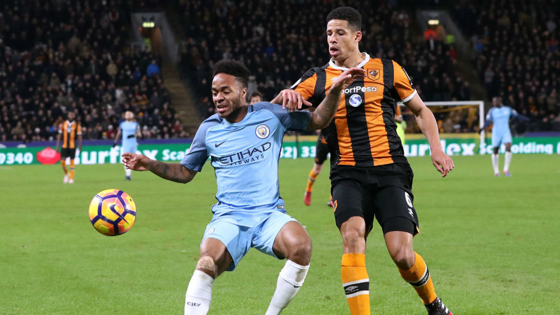 HOLD HIM OFF: Sterling looks to protect the ball from Hull defender Curtis Davies