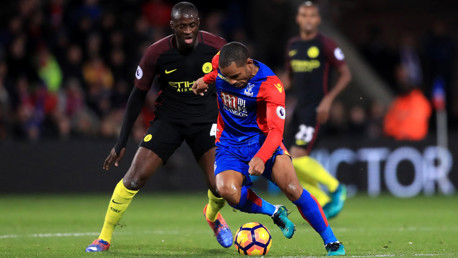 MIDFIELD DUEL - Yaya Toure and Jason Puncheon battle for the ball