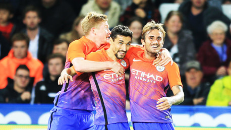 Aleix Garcia celebrates with Kevin De Bruyne and Jesus Navas
