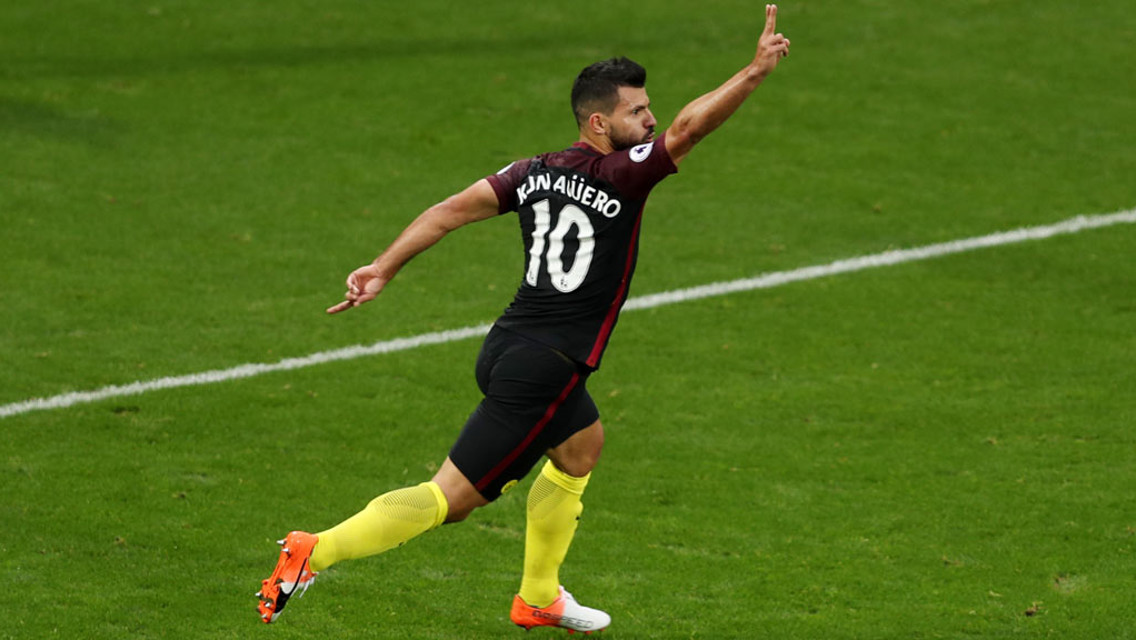 CELEBRATION: Sergio Aguero wheels away after thumping his first of the day