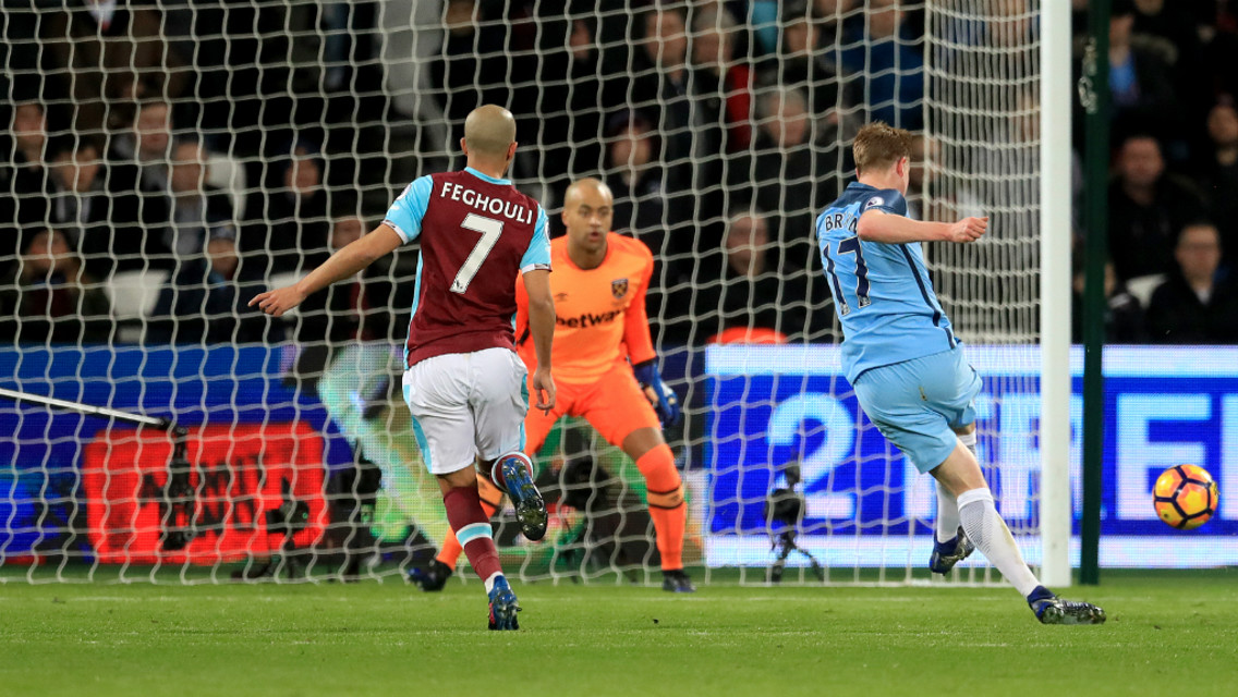 WHAT A FINISH: Kevin De Bruyne slots into the bottom corner for the opener