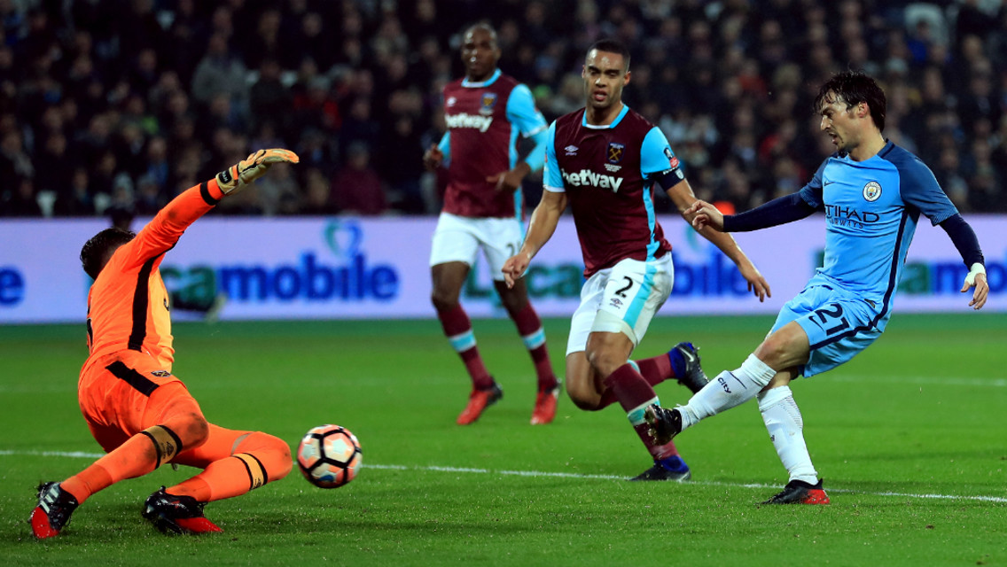 COOL: David Silva took his time and picked his spot for City's third at West Ham