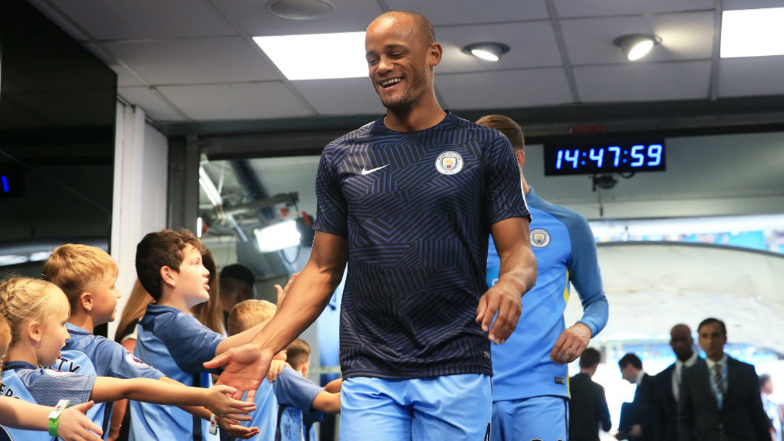 BIG SMILES: Vincent Kompany made his return to the match day squad in City's win over Bournemouth