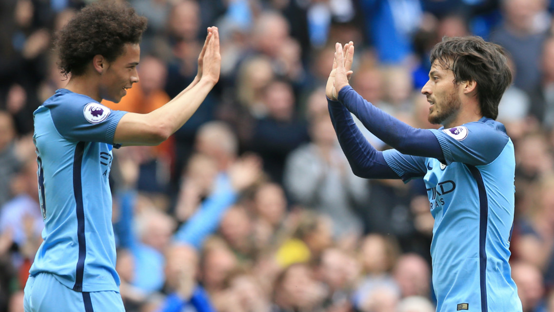 HIGH FIVE: Sane and David Silva celebrate the latter's goal.
